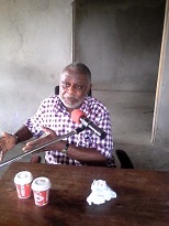 Director John Eta attending a live interview via the campus radio